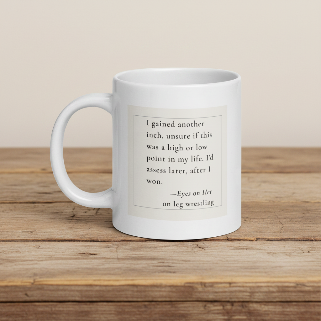 White mug with a printed quote on a wooden surface