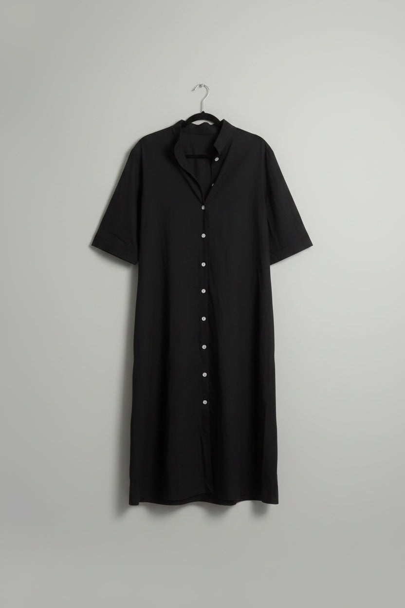 Black linen shirtdress with buttons on a white background