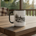 Mug with nature design on a wooden table outdoors
