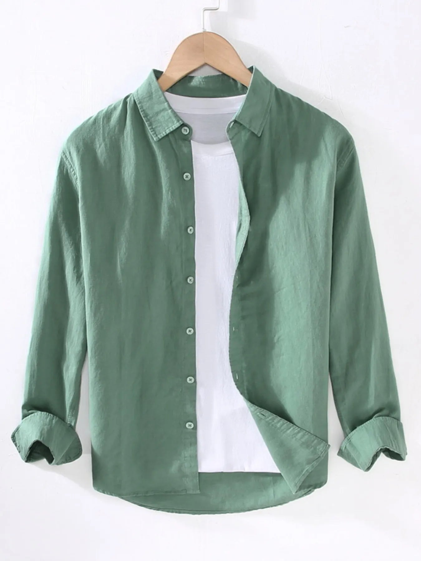 Weekend Cotton + Flax shirt in beige on a wooden hanger with white background
