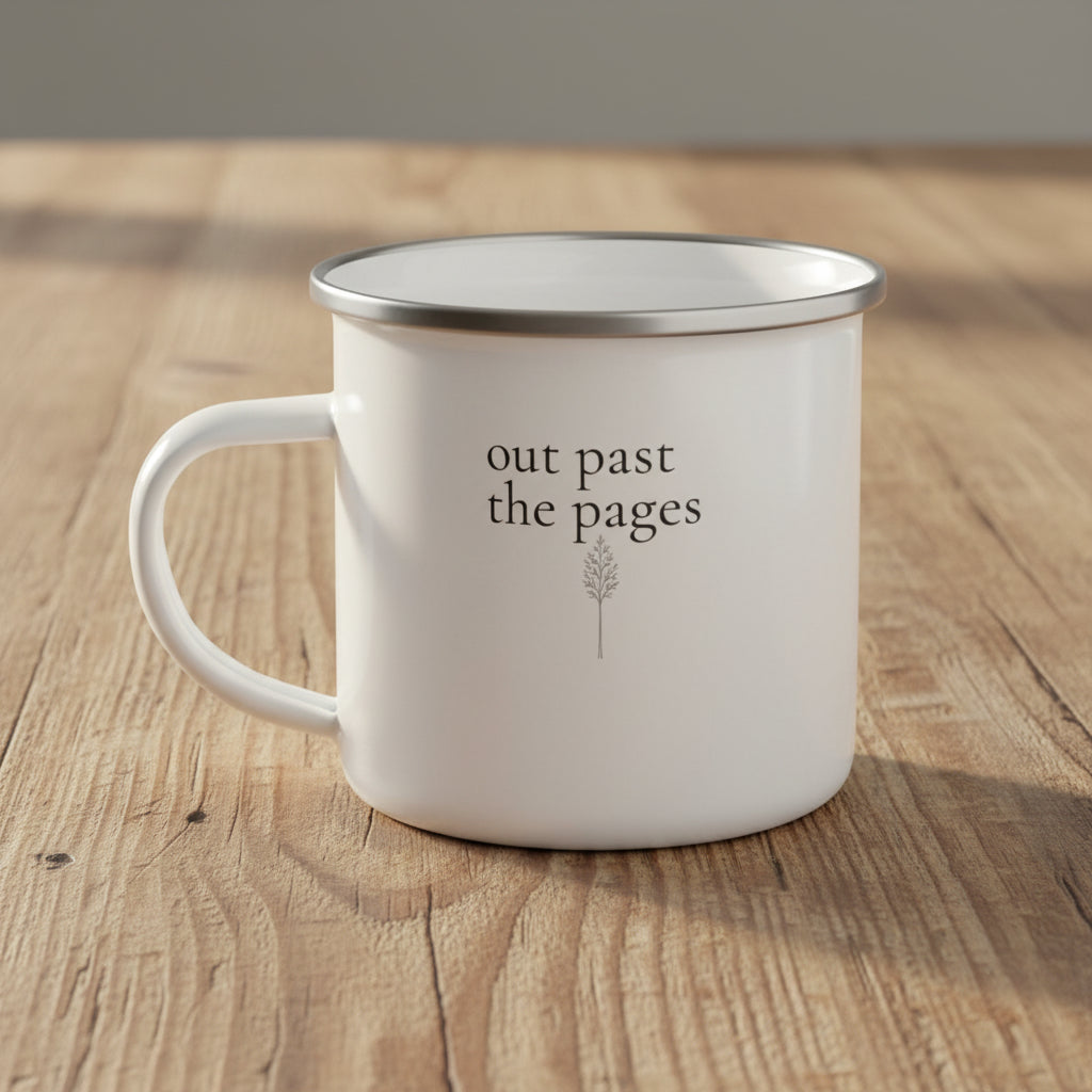 “Close up of “Out past the pages” enamel camp mug on reclaimed wood table
